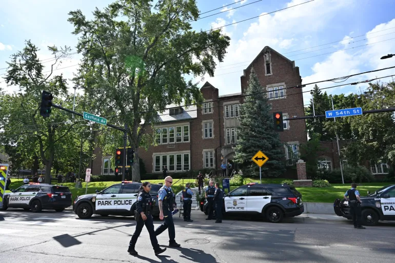 afp_68af361f8df3-1756313119 Minneapolis School Shooting