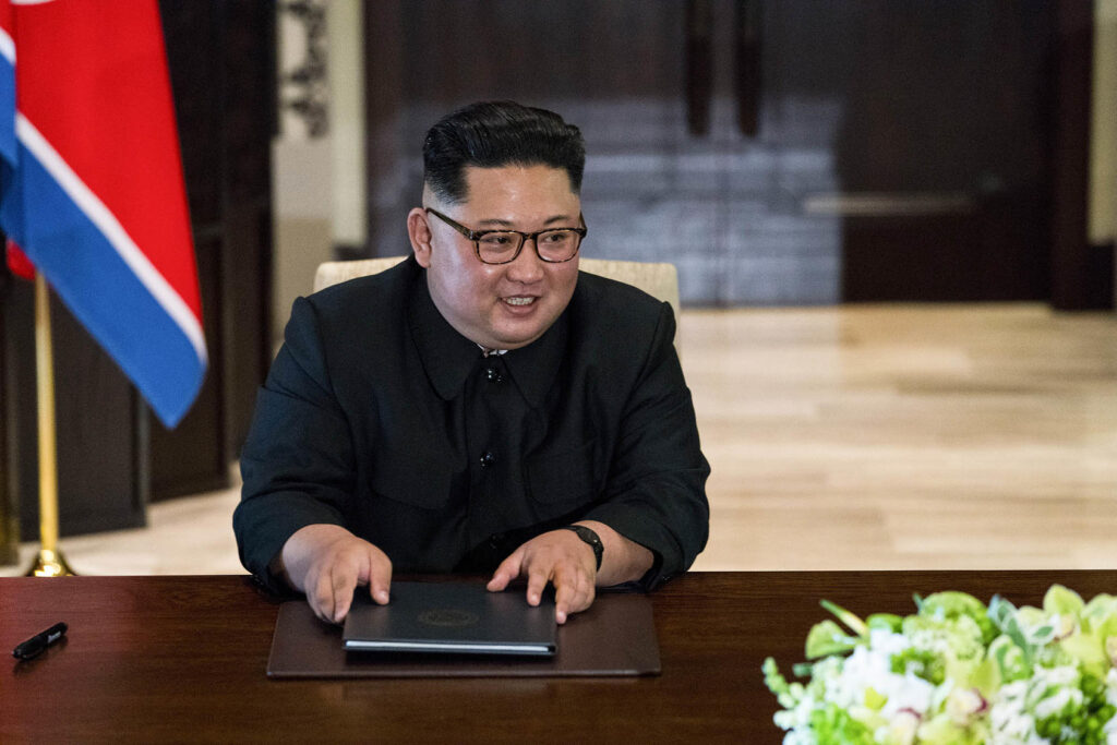 Kim Jong Un of North Korea signs a document during a ceremony with President Donald Trump on Sentosa Island in Singapore North Korea Declares Nuclear Status ‘Irreversible,’ Escalating Tensions with the West